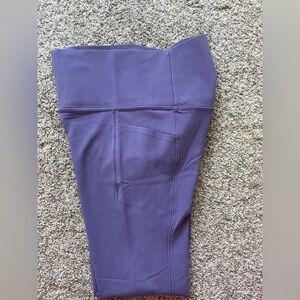 Athleta Salutation stash tight